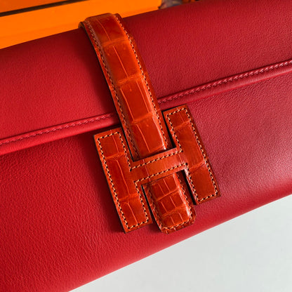 JIGE ELAN 29 CLUTCH IN RUBY RED CALFSKIN WITH APPLE RED LIZARD SKIN (MADE-TO-ODER)