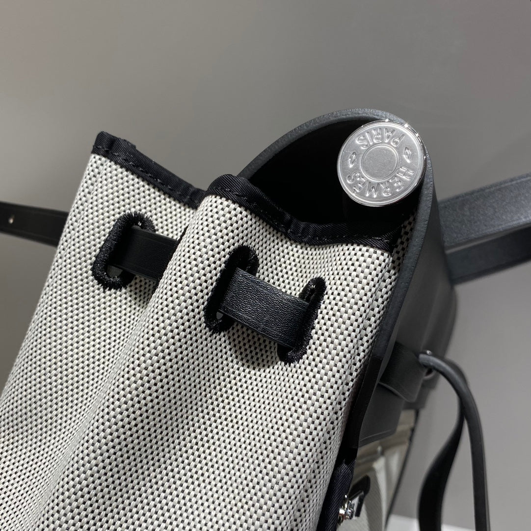HERBAG A DOS ZIP RETOURNE BACKPACK 29 IN OFF-WHITE CANVAS AND BLACK CALFSKIN
