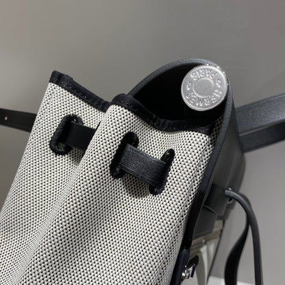HERBAG A DOS ZIP RETOURNE BACKPACK 29 IN OFF-WHITE CANVAS AND BLACK CALFSKIN