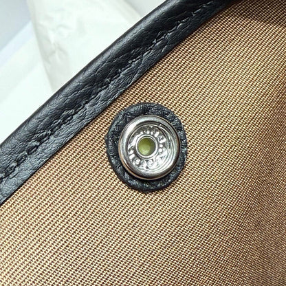 GARDEN PARTY 30CM IN ORANGE MINIMUM TOILETS COTTON CANVAS AND BLACK CALFSKIN