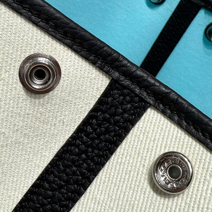 GARDEN PARTY 30CM IN WHITE TOILETS COTTON CANVAS AND BLACK CALFSKIN SKY BLUE CANVAS ON SIDE OTHER