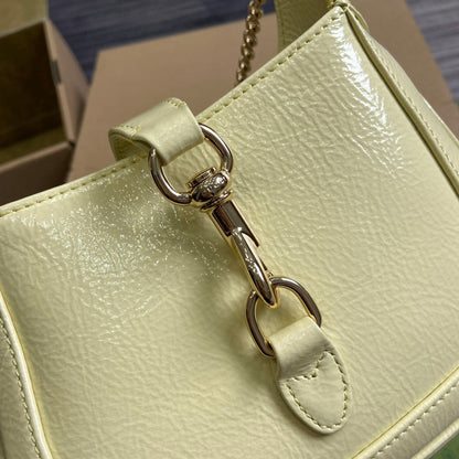 JACKIE NOTTE MINI BAG 19 IN LIGHT YELLOW CRACKED LACQUER CALFSKIN GOLD HARDWARE