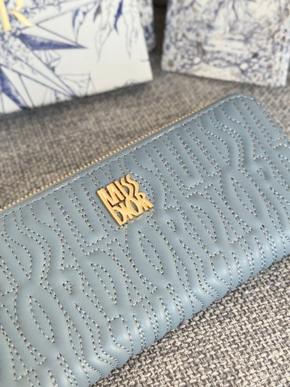 VERTICAL LONG ZIP WALLET 20 IN BABY BLUE QUILTED ALLOVER CALFSKIN