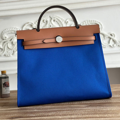 ZIP CABINE 31 BAG IN COBALT BLUE CANVAS AND BRONZE BROWN CALFSKIN