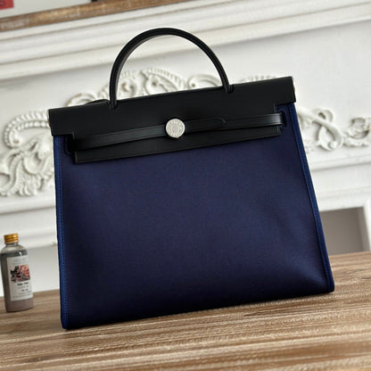 ZIP CABINE 31 BAG IN NAVY BLUE CANVAS AND BLACK CALFSKIN